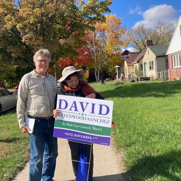 Candidate's parents with a campaign lawn sign